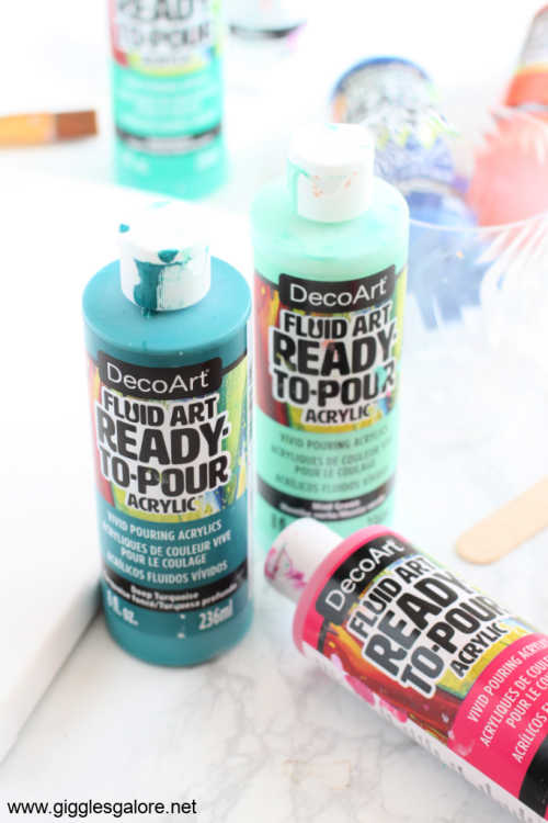 A picture of DecoArt's ready-to-pour acrylic paint bottles.